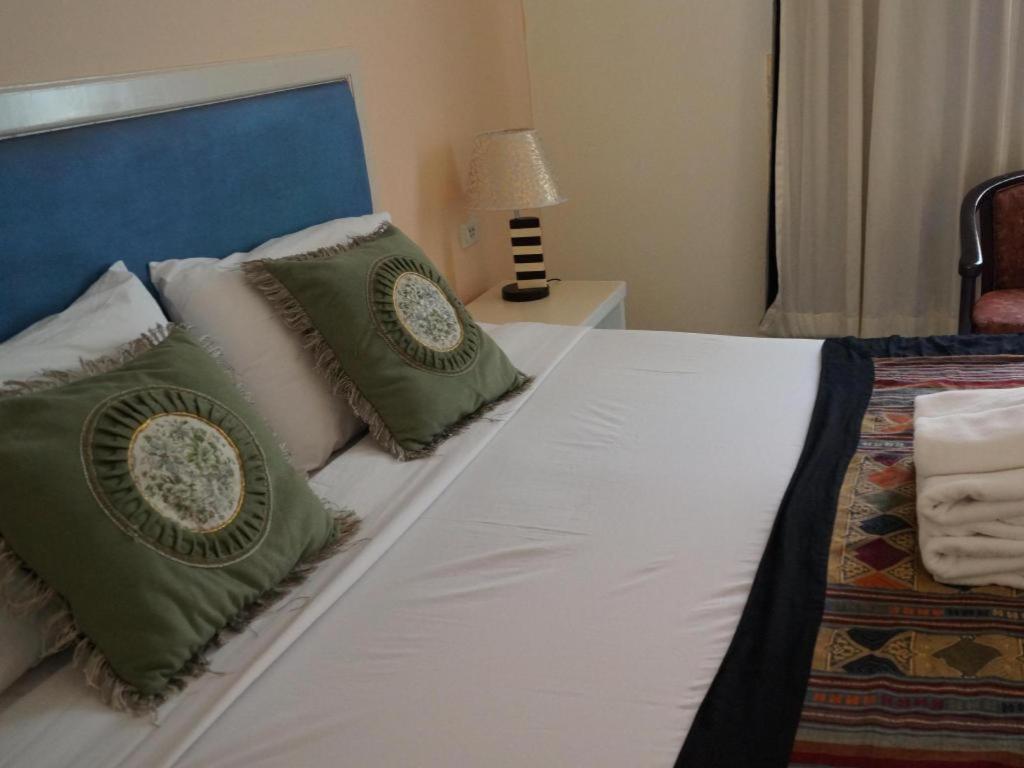 Seng Aroun Hotel Паксе Экстерьер фото